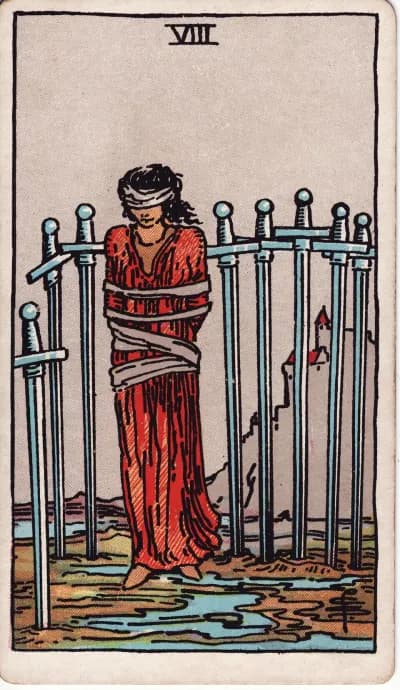 The Eight of Swords tarot card (Rider–Waite–Smith, 1909)