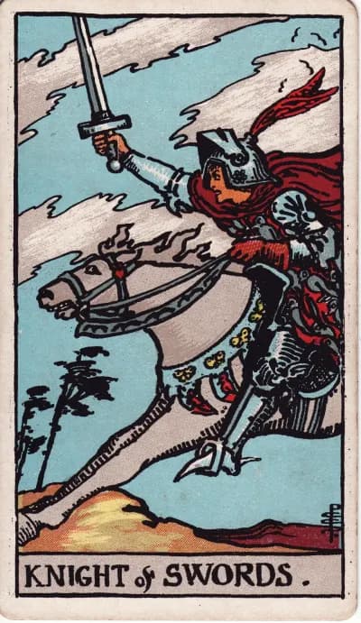 The Knight of Swords tarot card (Rider–Waite–Smith, 1909)