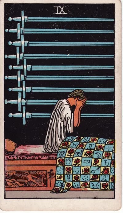 The Nine of Swords tarot card (Rider–Waite–Smith, 1909)