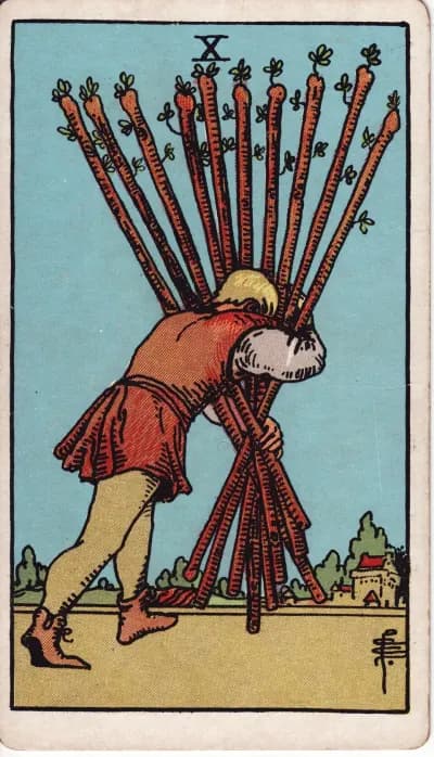 The Ten of Wands tarot card (Rider–Waite–Smith, 1909)