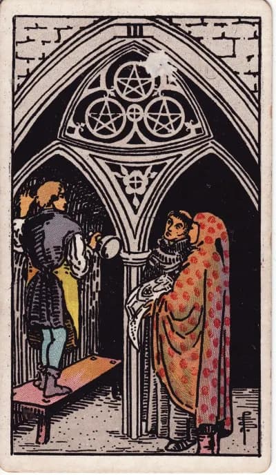 The Three of Pentacles tarot card (Rider–Waite–Smith, 1909)