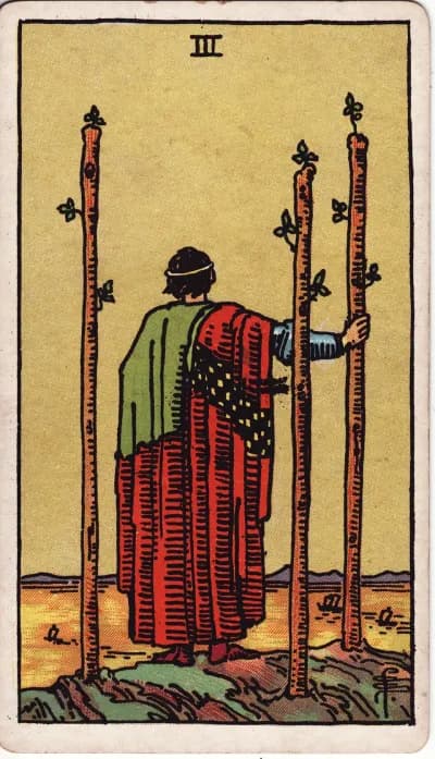 The Three of Wands tarot card (Rider–Waite–Smith, 1909)
