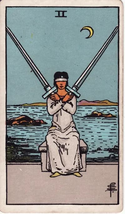 The Two of Swords tarot card (Rider–Waite–Smith, 1909)